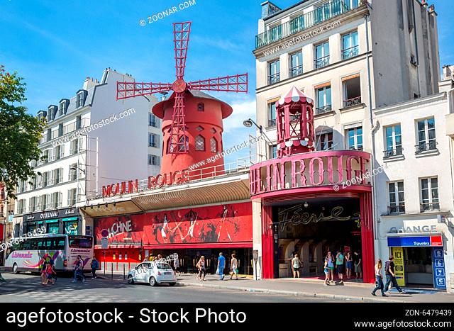 PARIS - JUN 22: The Moulin Rouge on June 22, 2014 in Paris, France. Moulin Rouge is a famous cabaret built in 1889, located in the Paris red-light district of...