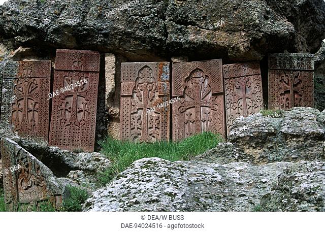 Armenia - Geghard Monastery (UNESCO World Heritage List, 2000), founded in the 4th century. A row of Khachkars, carved tombstones