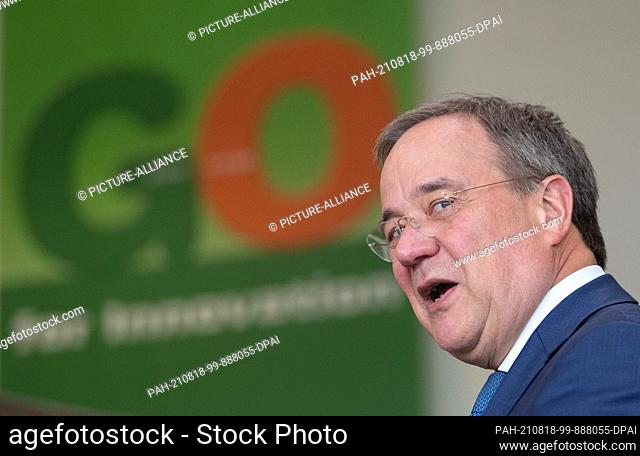 18 August 2021, Lower Saxony, Hasbergen: Armin Laschet, candidate for chancellor of the CDU/CSU and chairman of the CDU, speaks as part of his election campaign...