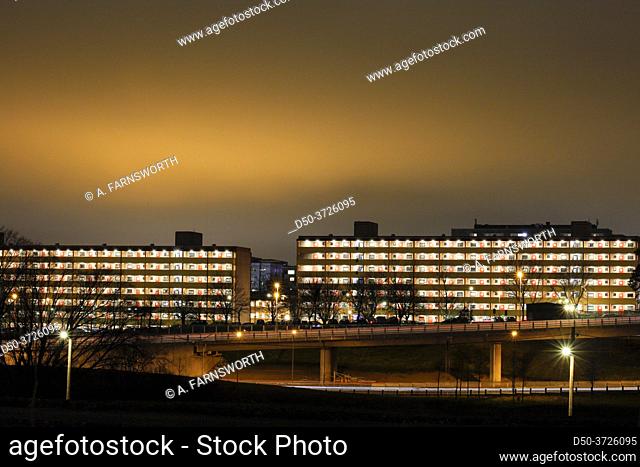 Stockholm, Sweden Apartment buildings and highway in the Rinkeby suburb at night