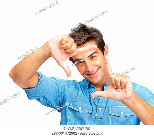 Closeup of smart young man making frame with hands over white background