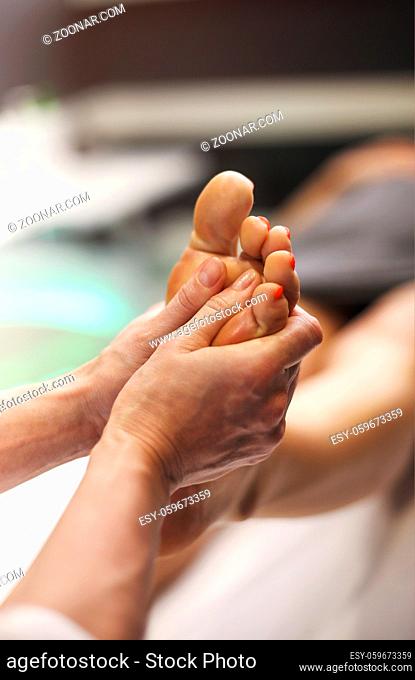 Foot massage, spa foot treatment. CLOSE UP
