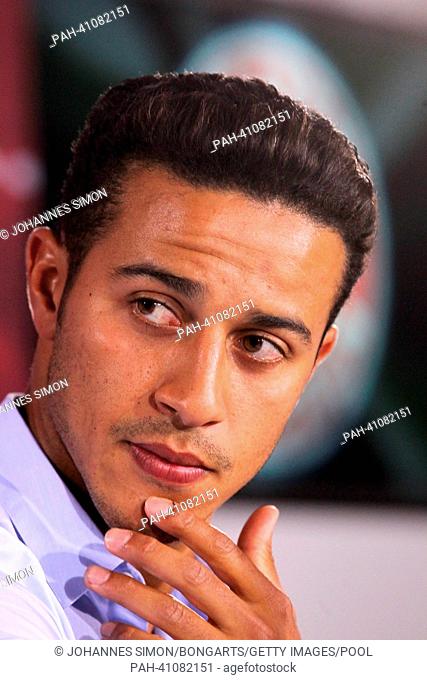 Bayern Munich's new Spanish midfielder Thiago Alcantara attends a press conference for his introduction as a new player for the German Bundesliga soccer club in...
