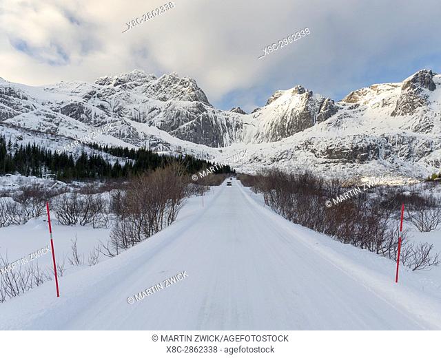 Landscape with country road on the island of Flakstadoya. The Lofoten Islands in northern Norway during winter. Europe, Scandinavia, Norway, February