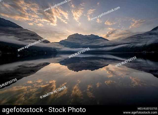 Austria, Styria, Altaussee, Lake Altaussee at foggy dawn