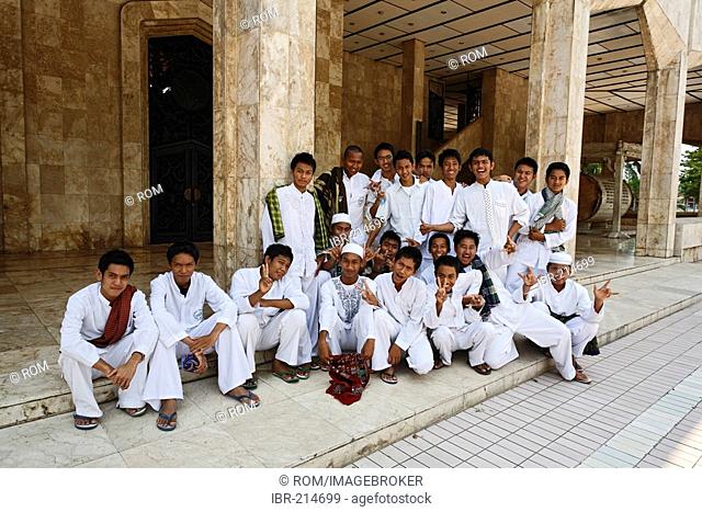 Youth in front of Mosque, Banjarmasin, South-Kalimantan, Borneo, Indonesia