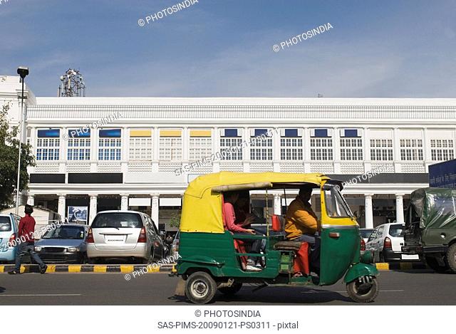 Auto rickshaw on the road, New Delhi, India