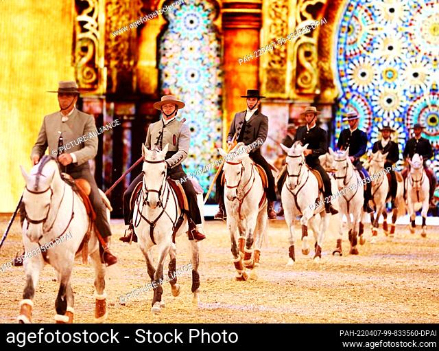 07 April 2022, North Rhine-Westphalia, Essen: A Portuguese equestrian group shows their tricks on horseback during the Hop Top Show Rhapsody