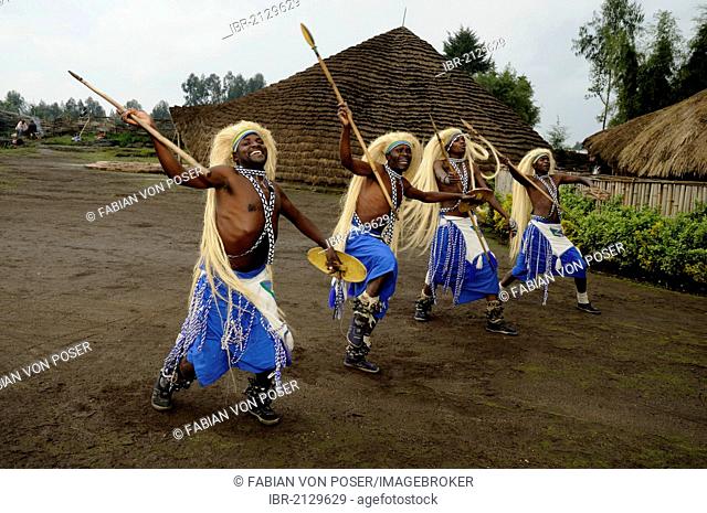Traditional dancers during a folklore event in a village of former hunters near the village of Kinigi on the edge of the Volcanoes National Park
