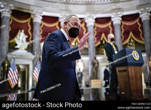 WASHINGTON, DC - JANUARY 06: United States Senate Majority Leader Chuck Schumer (Democrat of New York) waves before U.S. President Joe Biden delivers remarks on...