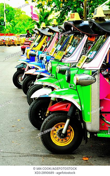row of parked tuk-tuks, , Bangkok, Thailand