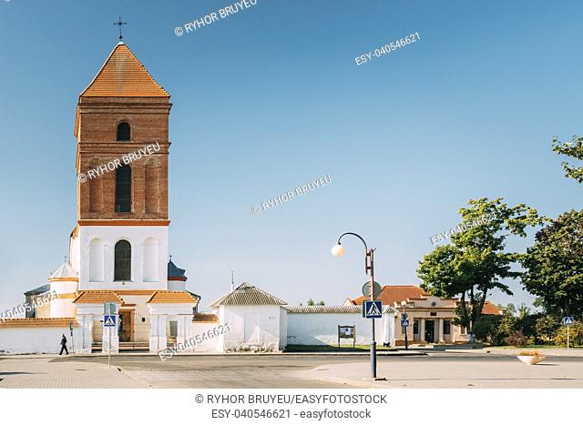 Mir, Belarus. Saint Nicolas Roman Catholic Church In Mir, Belarus. Famous Landmark In Sunny Summer Day With Blue Sky