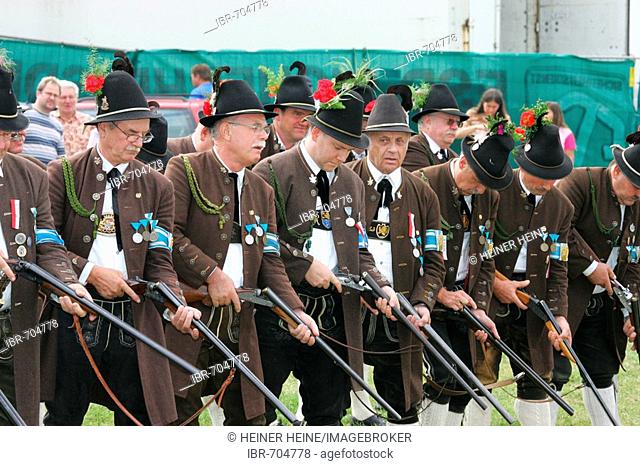 Riflemen firing a gun salute during a folk festival in Muehldorf am Inn, Upper Bavaria, Bavaria, Germany, Europe