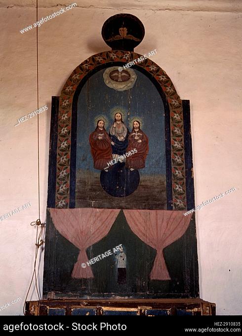 An altar in the church dedicated to the Trinity, Trampas, N.M., 1943. Creator: John Collier