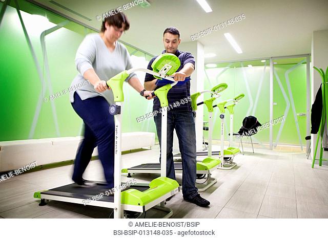 Reportage in the Obesity Clinic IPCO in Mulhouse, France. Physical exercise session with a masseur-physiotherapist. Patients must attend these sessions before...