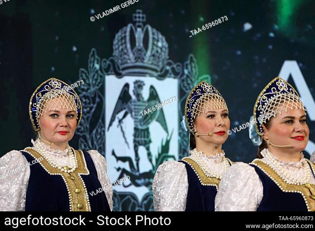 RUSSIA, MOSCOW - DECEMBER 21, 2023: Members of a folk dance ensemble perform at the opening of Arkhangelsk Region Day during the Russia Expo international...