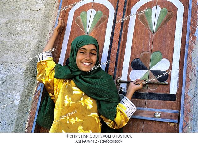 young girl smiling in Tiwi, Sultanate of Oman, Arabian Peninsula, Asia