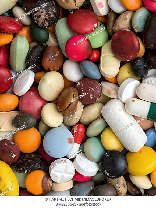 Expired medications, drugs, colourful mixture of pills, capsules and tablets, full-frame