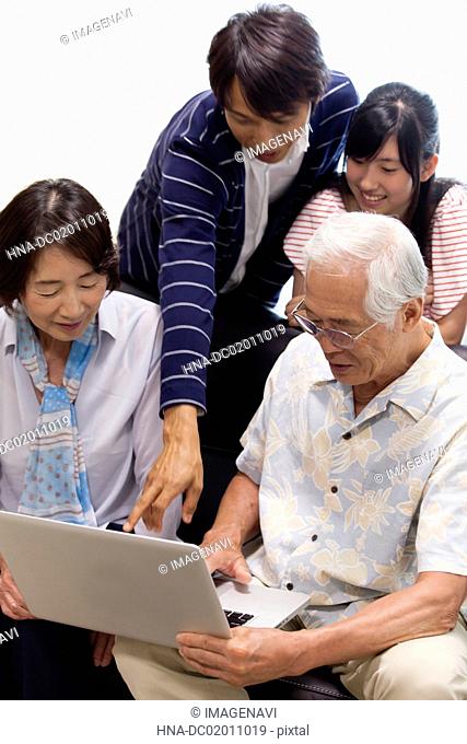 Family member seeing a laptop