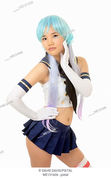 Beautiful and sexy Chinese woman having some fun with cosplay isolated an a white background