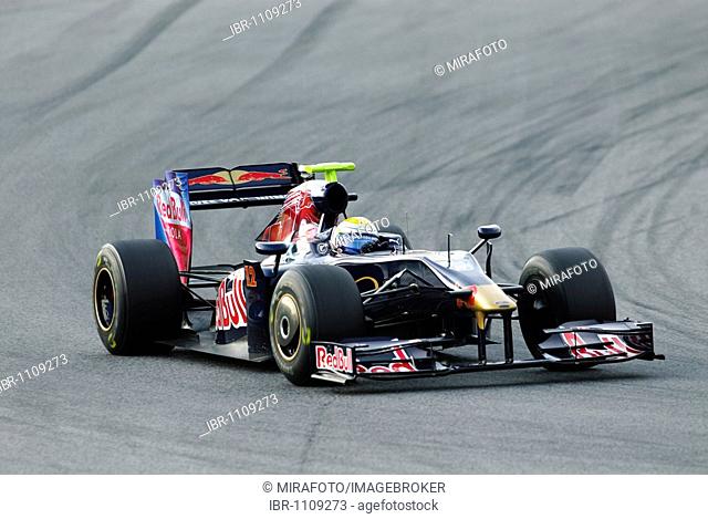 Sebastien Buemi in the Scuderia Toro Rosso STR4 during Formula One testing sessions on Circuit de Catalunya near Barcelona, Spain