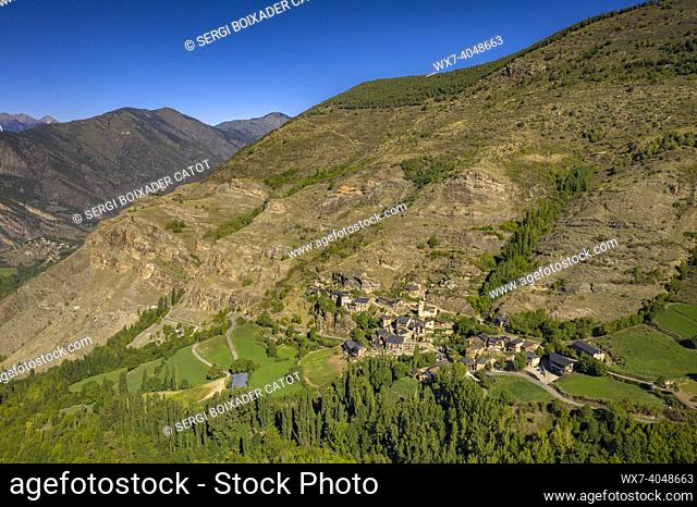 Aerial view of the town of Burg and the surrounding green fields, in the Coma de Burg valley (Pallars SobirÃ , Lleida, Catalonia, Spain, Pyrenees)