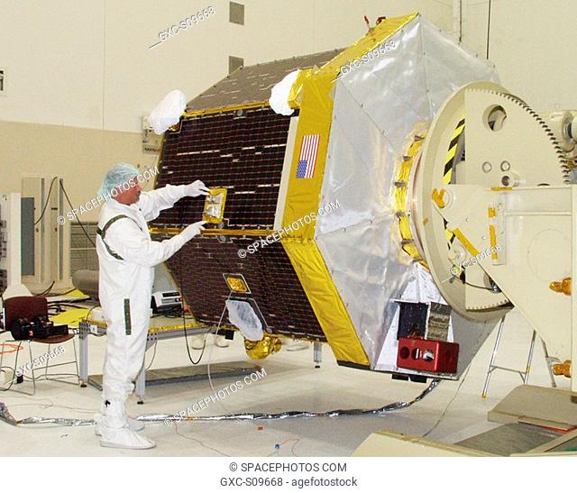 05/30/2002 -- A thermal technician with Johns Hopkins University Applied Physics Laboratory closes out the blanket around CONTOUR'S Earth-Sun Sensor