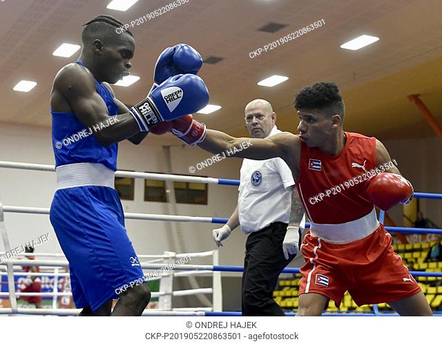 From left YOSBANY VEITIA SOTO of Cuba, PHILLIP MATOMBO of Canada in action during the fight in 50th boxing tournament Grand Prix Usti nad Labem, Czech Republic