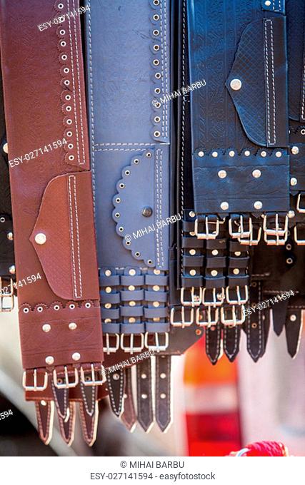 Color image of some leather belts on display