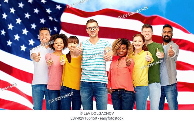diversity, race, ethnicity, immigration and people concept - international group of happy smiling men and women showing thumbs up over american flag background