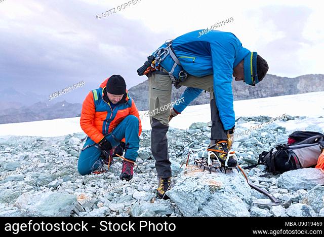 Climber on the way to the Bishorn summit with climbing iron (crampon)