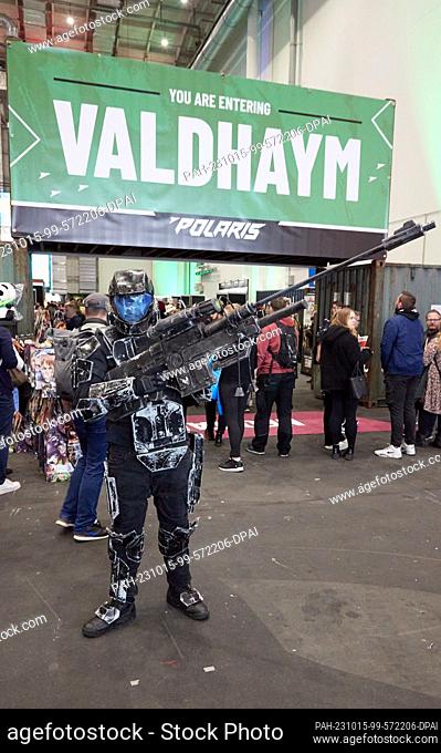 15 October 2023, Hamburg: Deniz Stahl, visitor from Hamburg, stands at the gaming fair ""Polaris Convention"" dressed as O.D.S.T