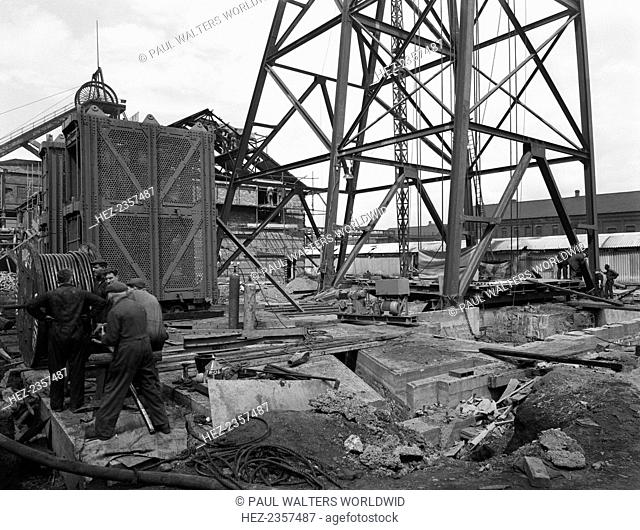 Installing a cage at Hickleton Main pit, Thurnscoe, South Yorkshire, 1961. During the drive to improve the pits in the South Yorkshire area during the 1950s and...