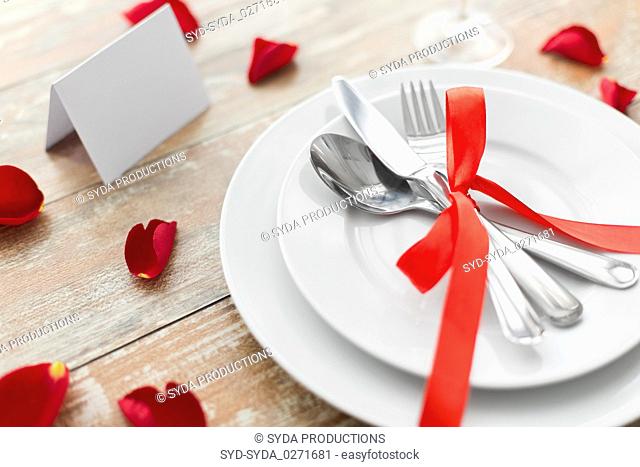 close up of table setting for valentines day