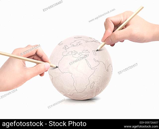 Two hand stroke drawing Europe map on paper ball on white background