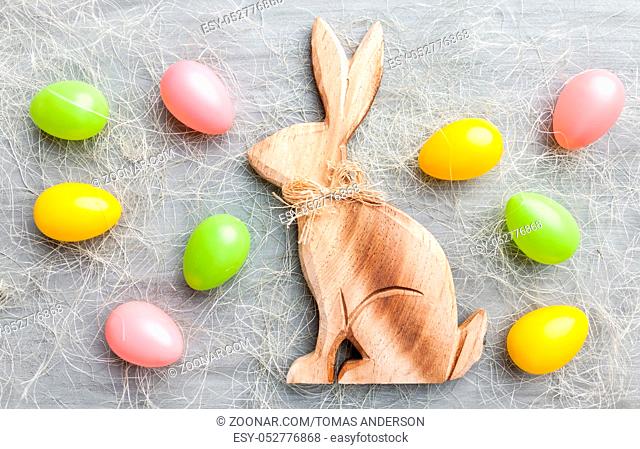 Traditional Easter holiday bunny on a rustic background