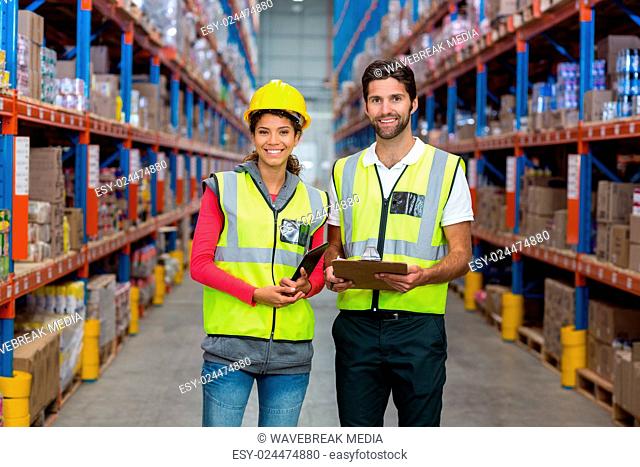 Portrait of workers are posing and smiling to the camera
