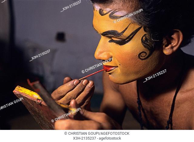 Kathakali performer applying makeup, State of Kerala, India, South Asia