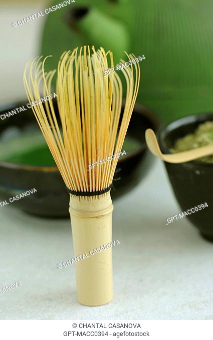 UTENSILS USED IN THE TRADITIONAL TEA CEREMONY, POWDERED JAPANESE GREEN TEA MATCHA IN ITS BOWL CHAWAN, A SMALL BAMBOO SCOOP CHASHAKU AND BAMBOO WHISK CHASEN