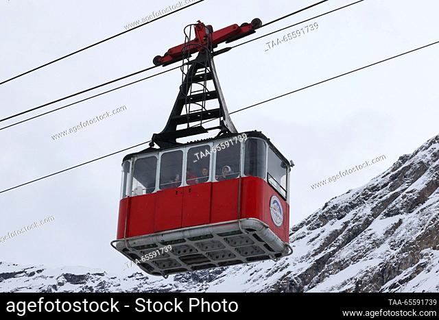 RUSSIA, KABARDINO-BALKAR REPUBLIC - DECEMBER 9, 2023: A view of a cableway at the Elbrus ski resort, in the village of Terskol, Elbrussky District