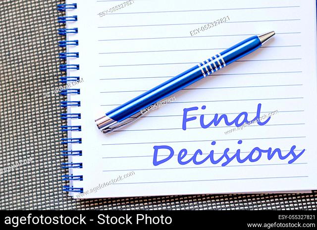 Final decisions text concept write on notebook with pen