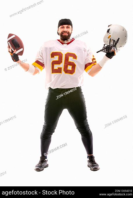 Bearded American football player posing in white uniform