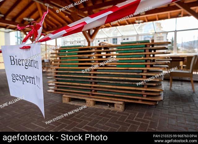 25 March 2021, Saarland, Mettlach: The beer garden of the Abbey Brewery is still closed. After Easter, many businesses, shops and outdoor restaurants in the...