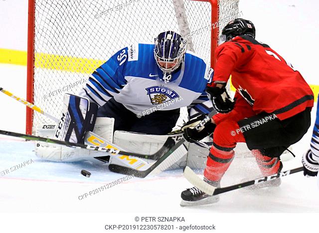 L-R Justus Annunen (FIN) and Dawson Mercer (CAN) in action during a preliminary match between Canada and Finland prior to the 2020 IIHF World Junior Ice Hockey...