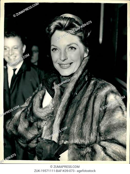Nov. 11, 1957 - American Singing Star Arrives in London. Julie London at Paddington: Julie London popular American singing star and her two children Lisa (5)...