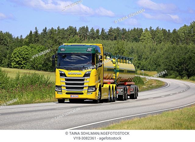 Colorful Next Generation Scania R580 V8 tank truck of K Pekki Oy hauls load along highway on a beautiful day of summer. Salo, Finland - July 1, 2018
