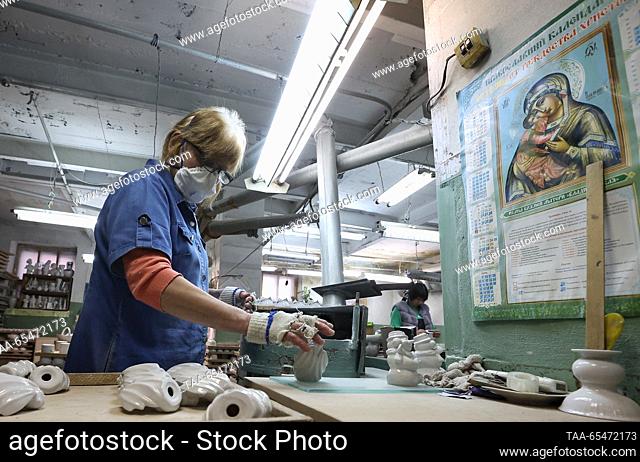 RUSSIA, SVERDLOVSK REGION - DECEMBER 4, 2023: An employee is at work at a polishing line of the Sysert porcelain factory. Donat Sorokin/TASS