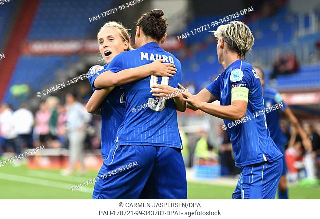 Ilaria Mauro of Italy cheers over her 1-1 equalizing score eith team mates Valentina Cernoia (L) and Melania Gabbiadini (R) during the women's European Soccer...