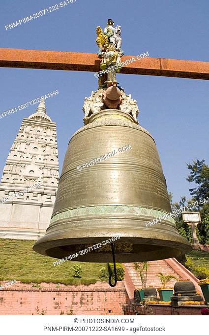 Bell hanging in front of a temple, Mahabodhi Temple, Bodhgaya, Gaya, Bihar, India