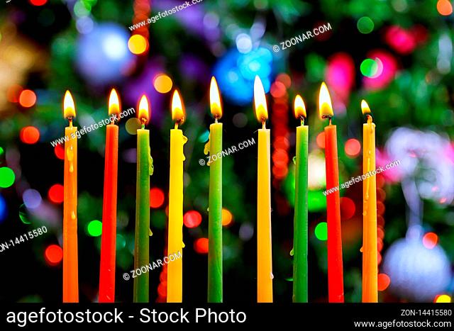Jewish holiday Hanukkah menorah with burning candles